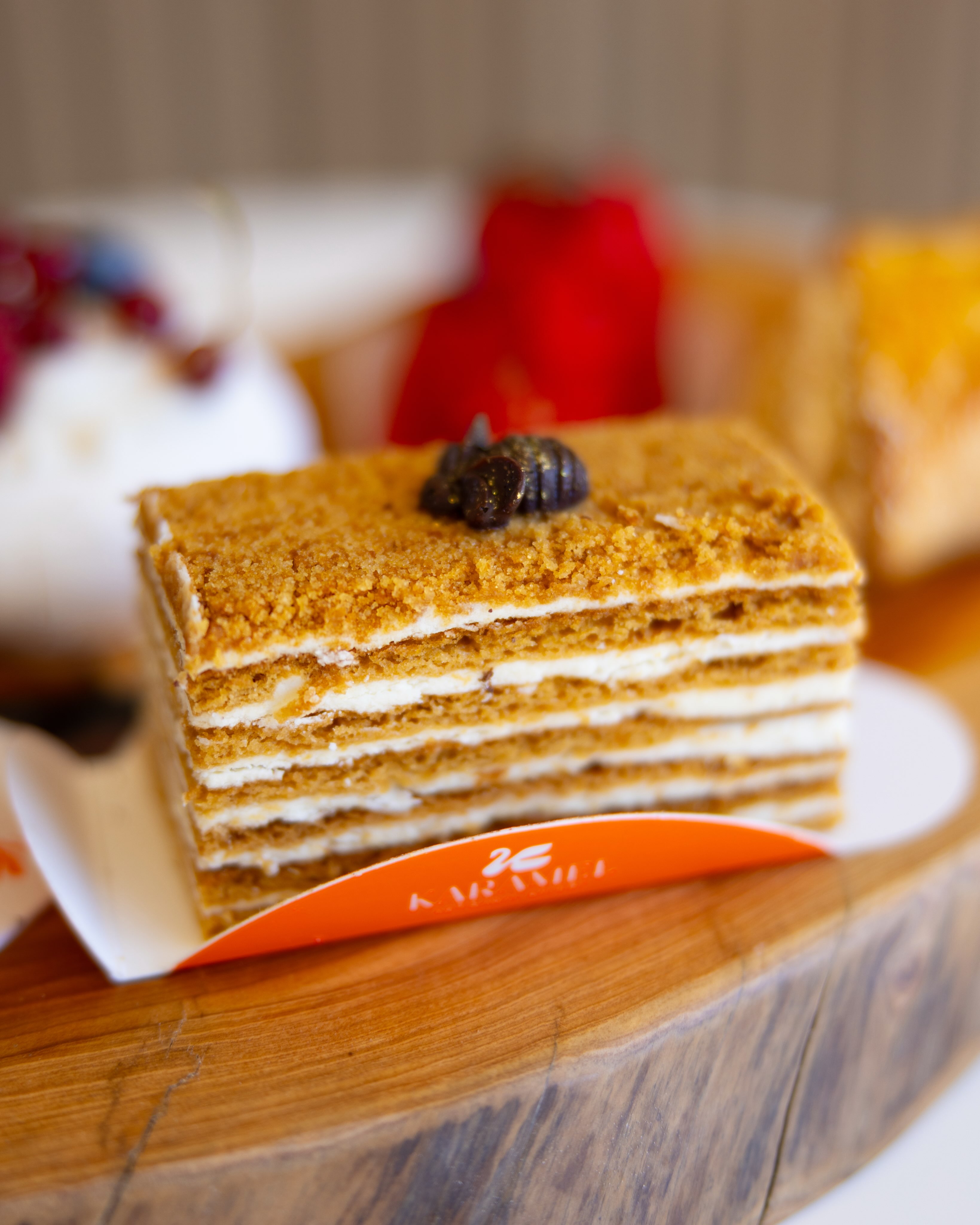 Layered honey cake slice from Karamel Artisanal Bakery